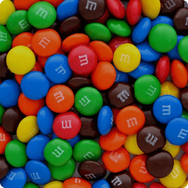 Mars logo with candy on background