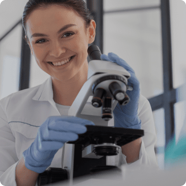 USA Scientific logo with person at a microscope on background