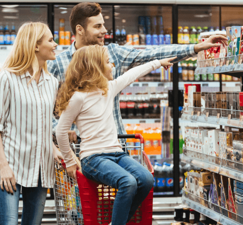 Man, woman and girl doing shopping